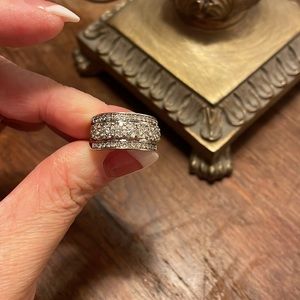 Solid 10 carat white gold and genuine diamond ring.